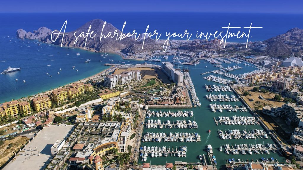 Aerial view of a luxury marina in Mexico with docked yachts, showcasing excellent infrastructure and strategic location.