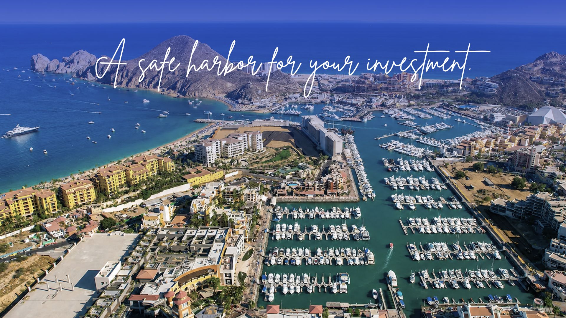 Aerial view of a luxury marina in Mexico with docked yachts, showcasing excellent infrastructure and strategic location.